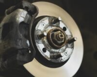 white and silver round device